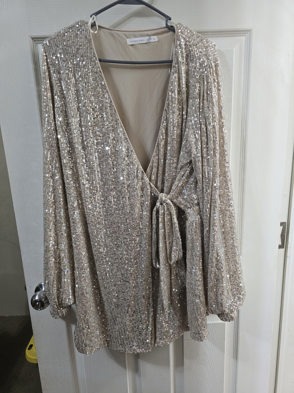 ALTAR'D STATE Sequin Wrap Romper in Champagne.